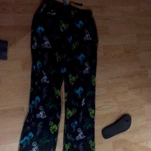 Long boys sweatpants with silhouettes of motorcycles and biker on it
